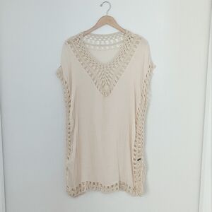 Crochet swim coverup.